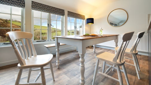 The open-plan kitchen, sitting and dining room at Cloud Farmhouse, Devon